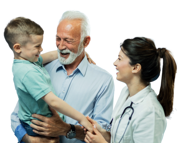 Image of a grandfather carrying a young boy while a doctor smiles during a consultation.