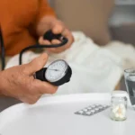Older person checking their blood pressure with tensiometer